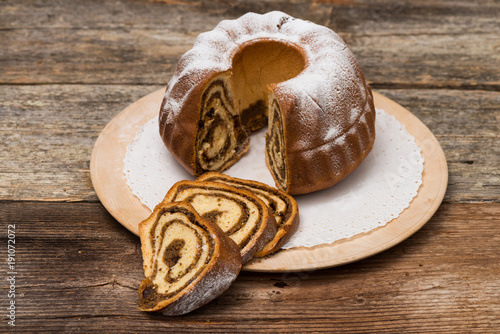 Potica/Potizza, Roll with walnuts on the festive table