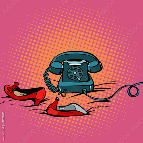 retro phone and womens red shoes