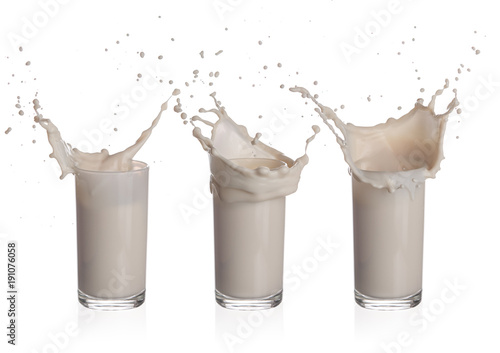 Milk splashing from glass isolated on a white background