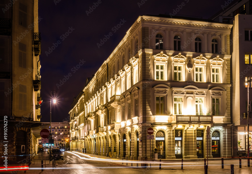 Night view on the historic building at Prozna street in iWarsaw, Poland