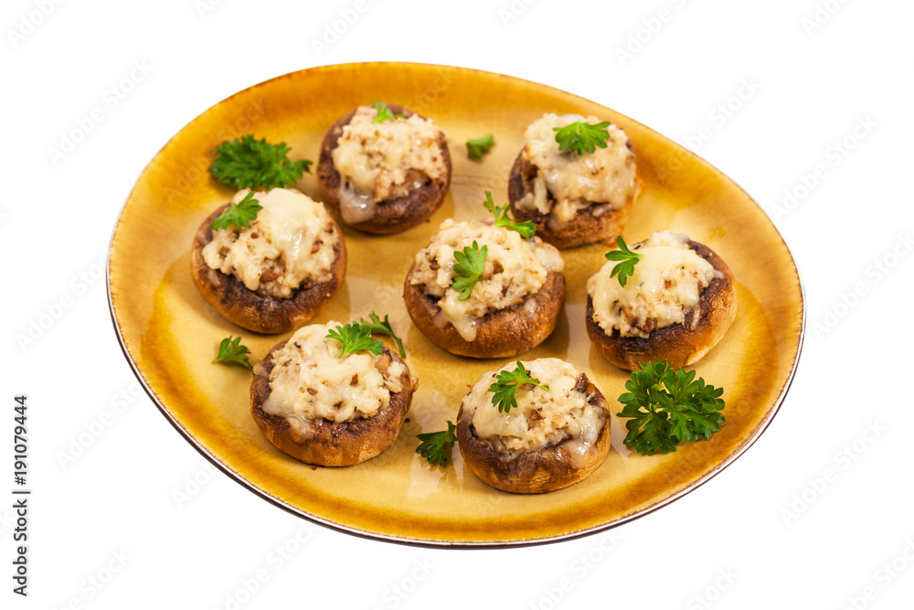 Vegetarian Stuffed Mushrooms Isolated on White Background. Selective focus.