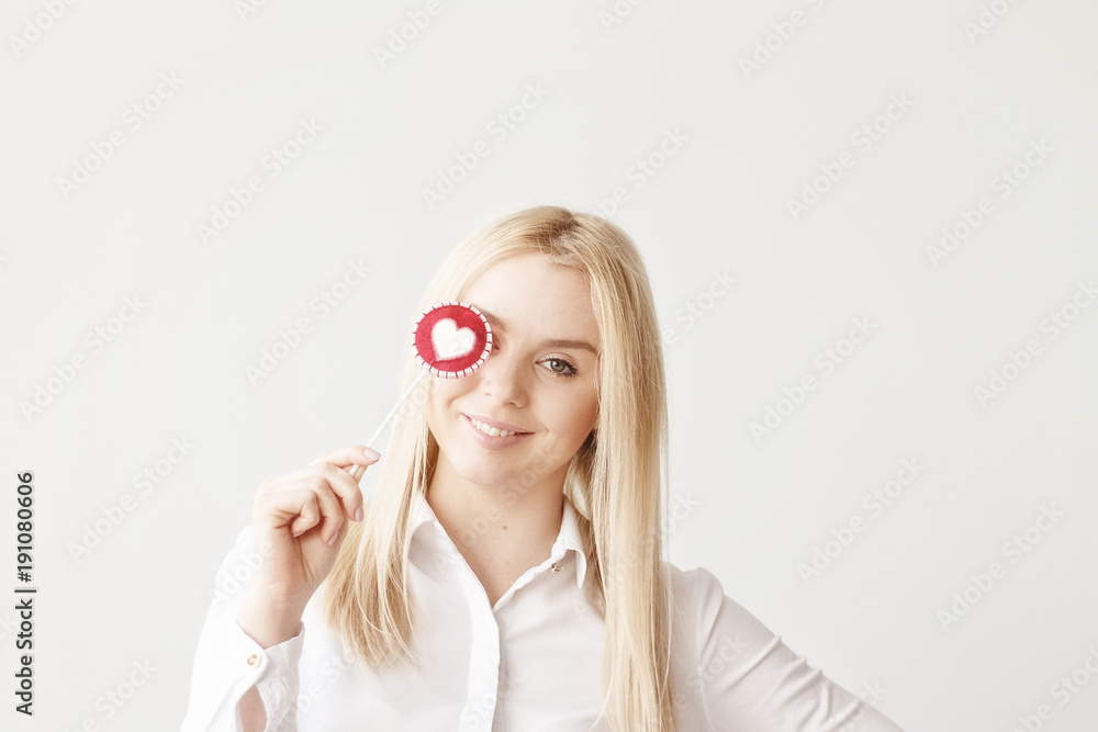 beautiful young girl and candy heart, Valentine's day beautiful young girl and candy heart, Valentine's day