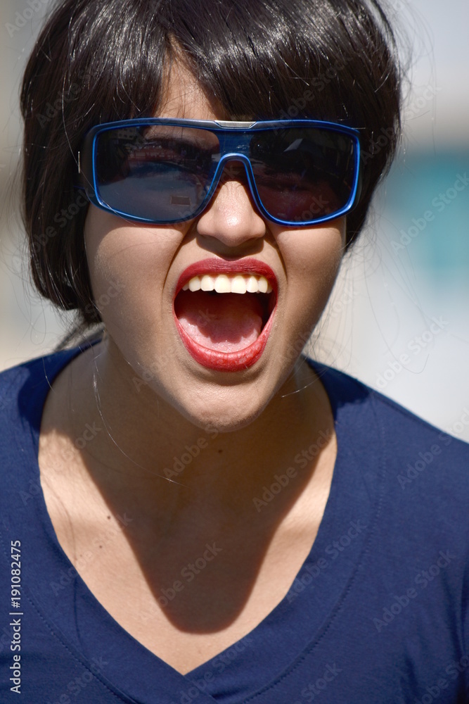 Minority Woman Shouting Wearing Sunglasses Minority Woman Shouting Wearing Sunglasses