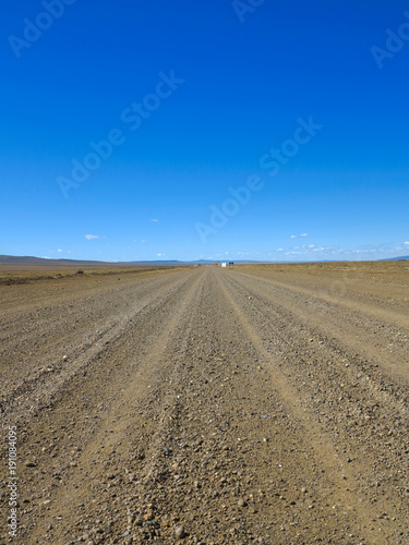 Empty Desert Gravel Road. Blue Sky. Hot Weather. Landscape Without People. Desert View. The Wilds. 