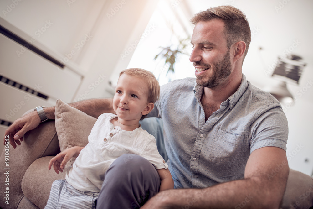 Close up of father and son at home. Close up of father and son at home.