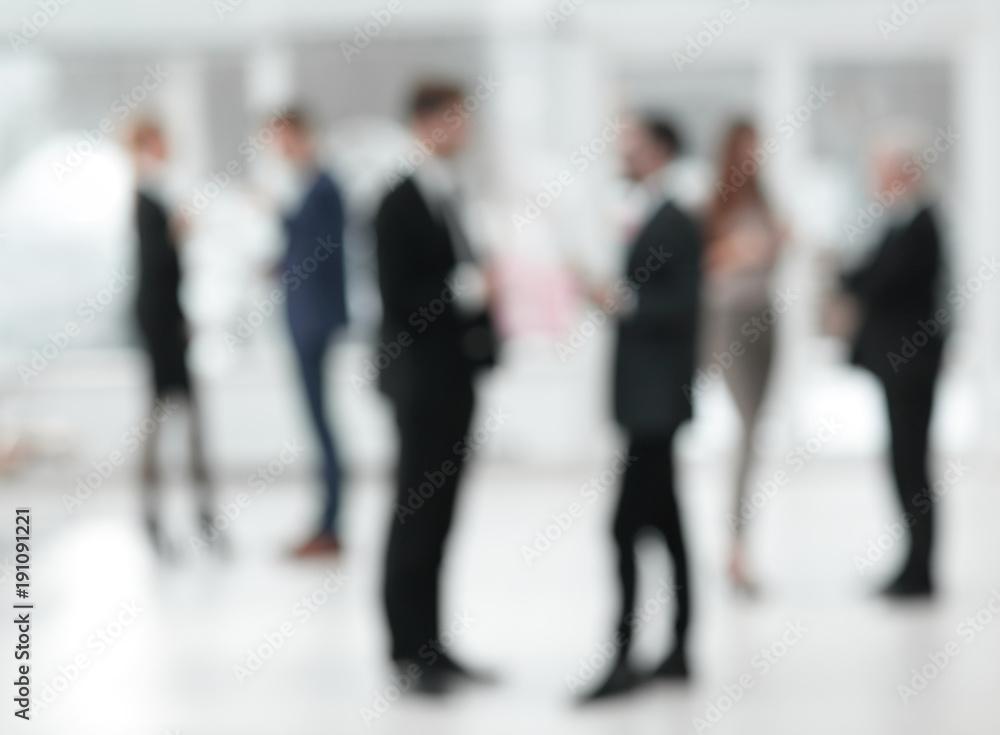 blurred image of business team in office.business background. blurred image of business team in office.business background.