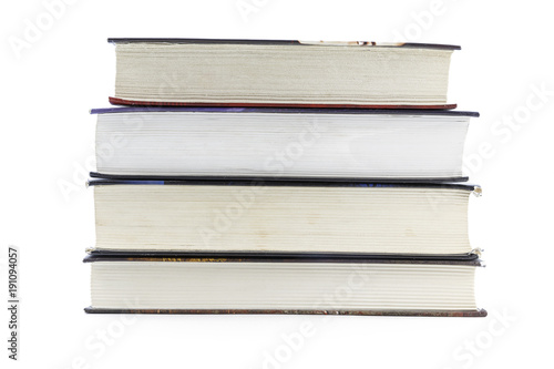 A stack of books lying on a white background