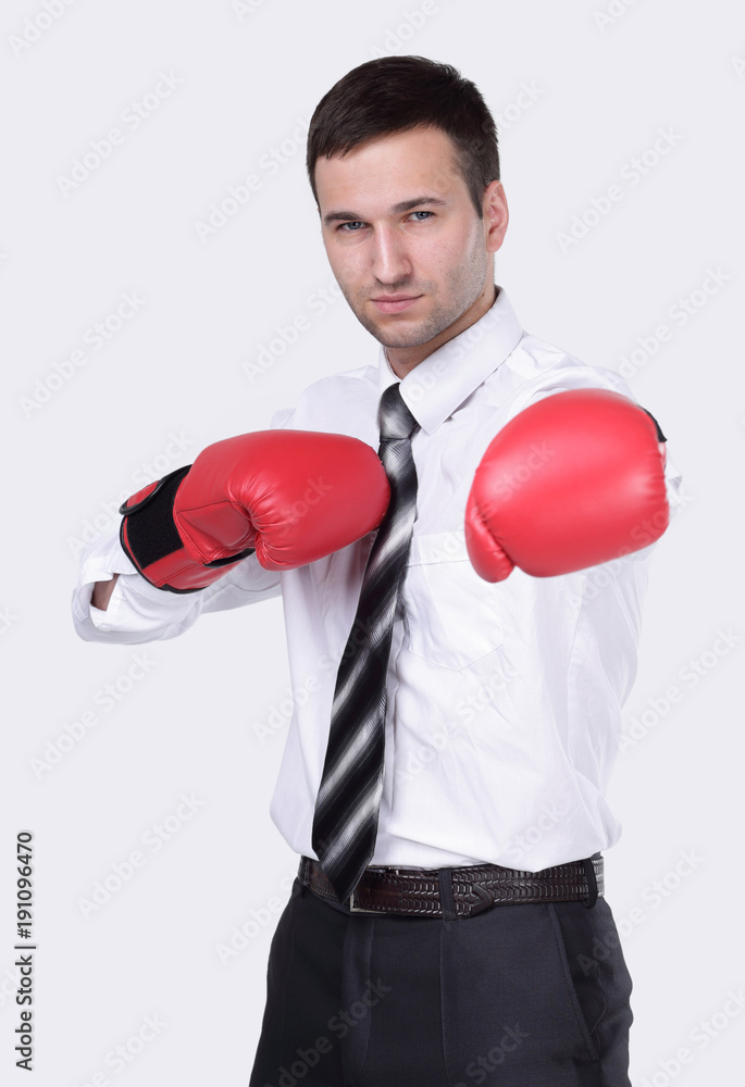 Competitive businessman in boxing gloves. Competitive businessman in boxing gloves.