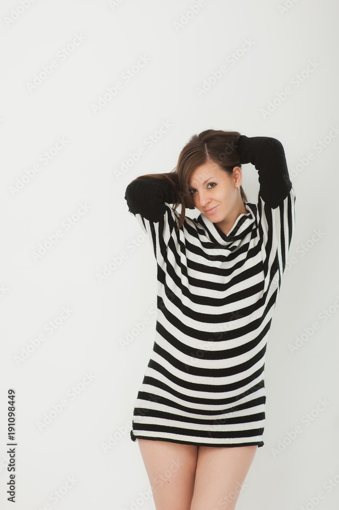 Beautiful fashion pregnant young happy brunette woman in striped black white dress with big belly, tummy. Pregnancy, parenthood, family, motherhood, parents, children, people and expectation concept. Beautiful fashion pregnant young happy brunette woman in striped black white dress with big belly, tummy. Pregnancy, parenthood, family, motherhood, parents, children, people and expectation concept.