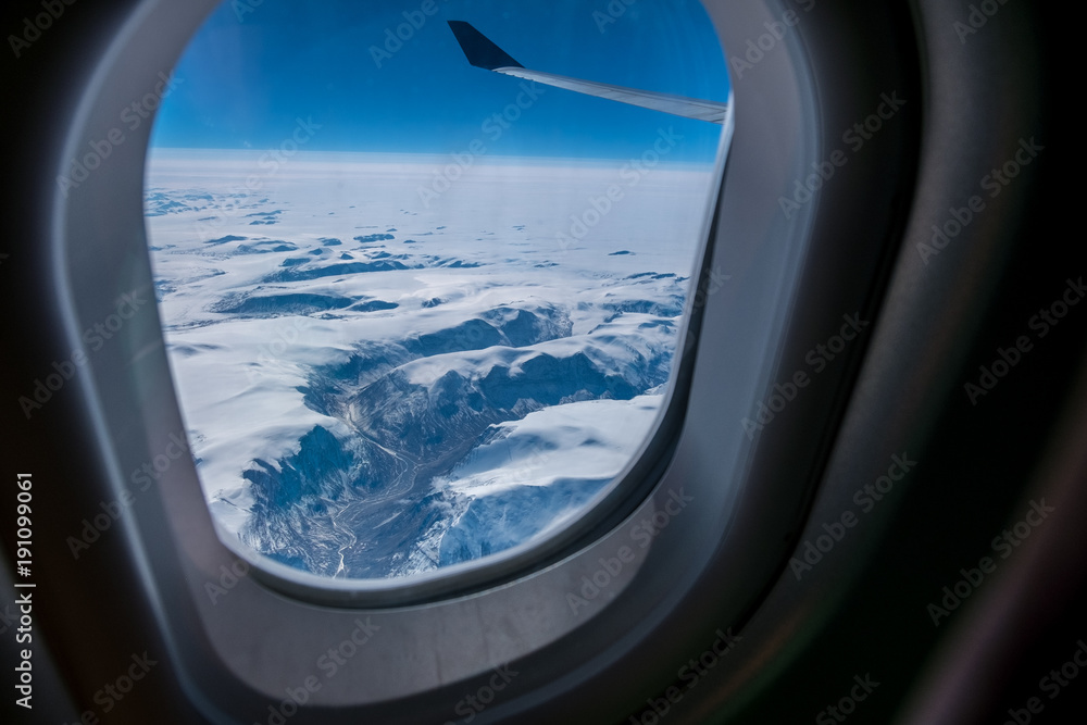 Greenland from the airplane window. Greenland full of glaciers.