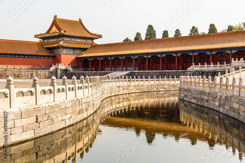One of the Inner yards in the emperor forbidden city wit moat, stone fence and decorated tower, Beijing, China
