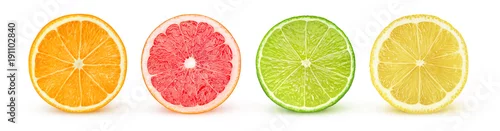 Obraz  z motywem Isolated citrus slices. Fresh fruits cut in half (orange, pink grapefruit, lime, lemon) in a row isolated on white background with clipping path