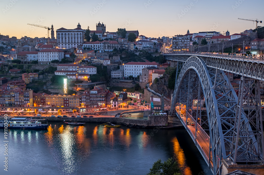 Evening view at Porto, Portugal. View at Ribeira and Dom Luis I Bridge.