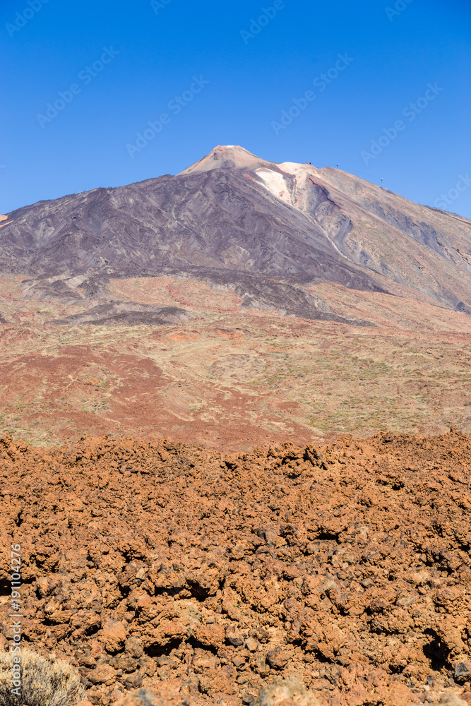 Teide National Park, Tenerife, Canary Islands - A picturesque view of the colourful Teide volcano, or in spanish 'Pico del Teide'. The tallest peak in Spain with an elevation of 3718 m