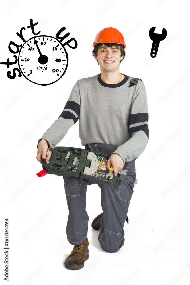 Business concept of self-made man. Young laborer man in orange helmet over white background with sketches. Business concept of self-made man. Young laborer man in orange helmet over white background with sketches.