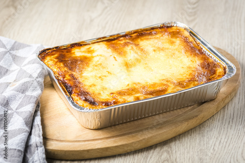 a portion of lasagna straight from the oven