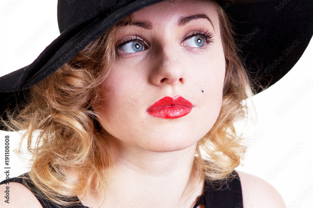 Pretty blond girl model like Marilyn Monroe in black dress with red lips on white background. 50's Vintage Fashion and Style. B&W. Portrait of rich young woman, material girl, femme fatale Pretty blond girl model like Marilyn Monroe in black dress with red lips on white background. 50's Vintage Fashion and Style. B&W. Portrait of rich young woman, material girl, femme fatale