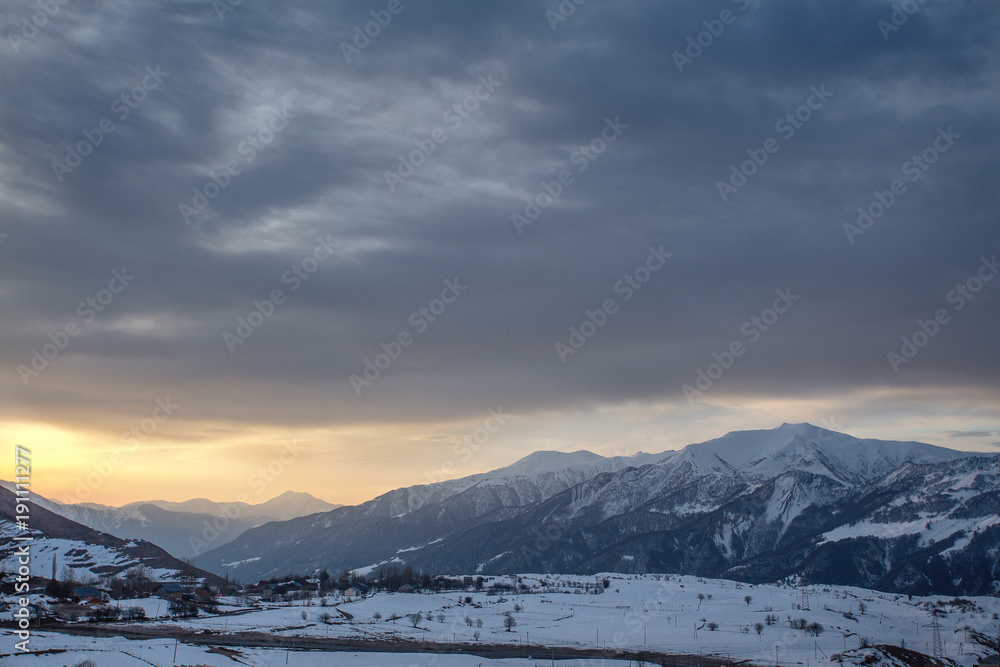 Sunset on the Caucasus mountains at the winter time, Gudauri