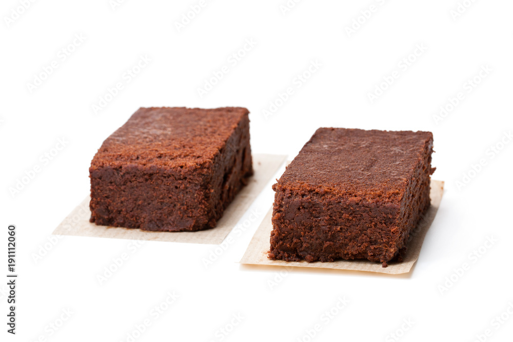 Chocolate  brownie pieces isolated on white
