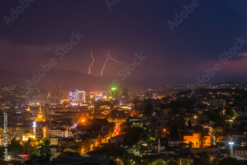 Beautiful lightning over the skyline of modern city at night