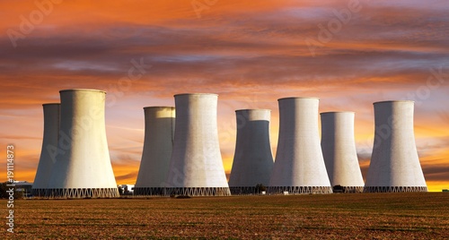 Evening colored sunset view of Nuclear power plant photo