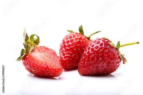Red frsehly harvested straberry on white background