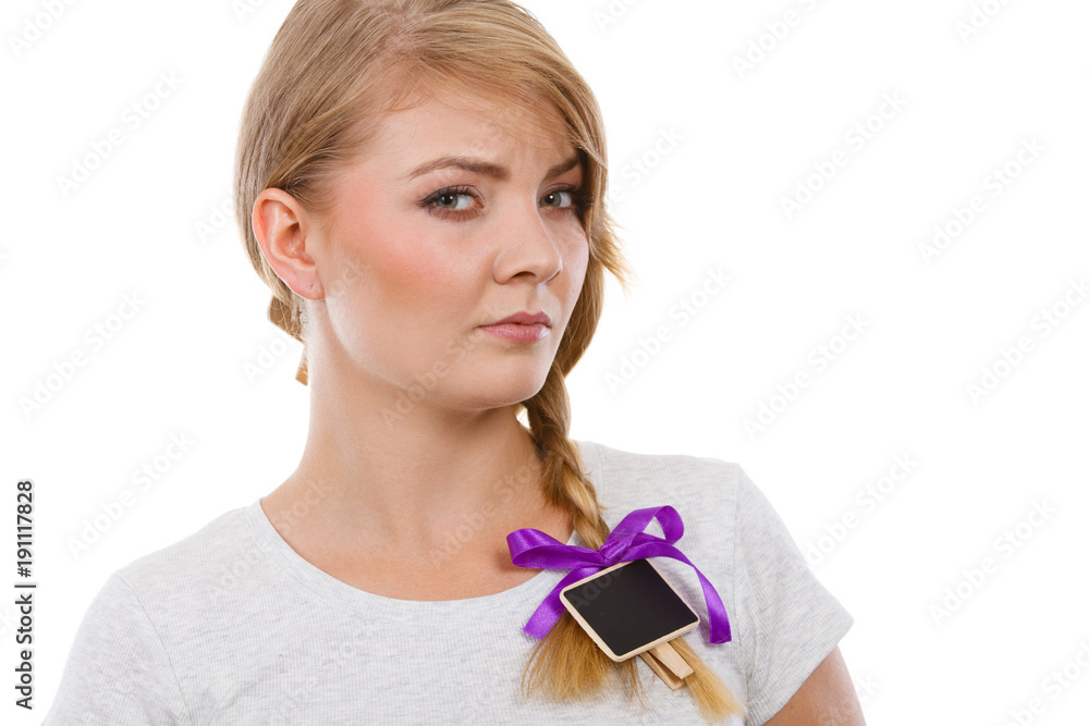 Teenage girl having little blackboard in hair Teenage girl having little blackboard in hair