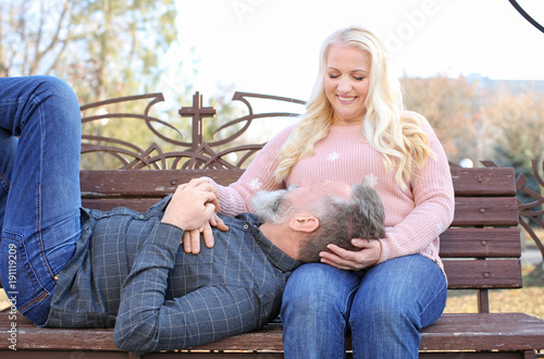 Happy mature couple resting...