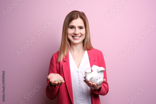 Young woman with broken pig...