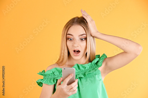 Young woman talking on cell...