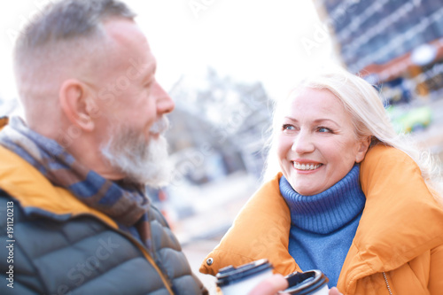 Happy mature couple with co...
