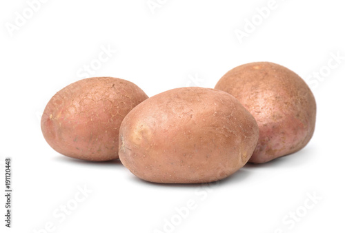 Fresh raw potatoes on white background