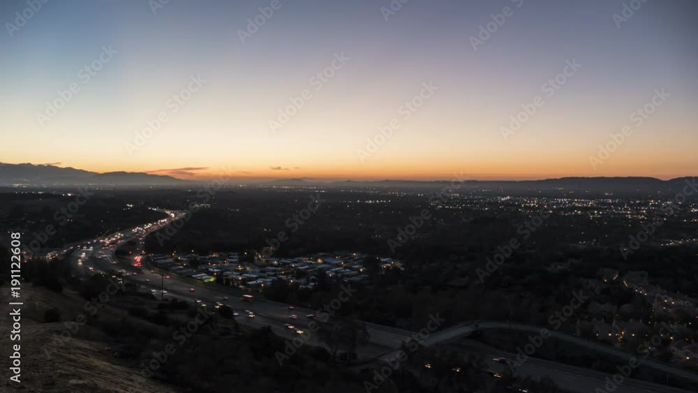 Sunrise time lapse view of route 118 freeway near Topanga Canyon Bl in the San Fernando Valley area of Los Angeles, California. Sunrise time lapse view of route 118 freeway near Topanga Canyon Bl in the San Fernando Valley area of Los Angeles, California.