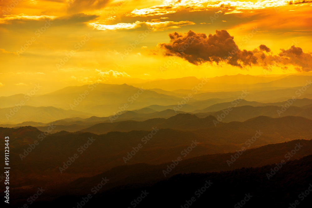 Dramatic scene Majestic sunset in the mountains landscape with clouds