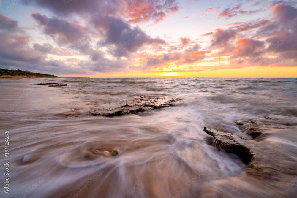 Sunset over the beach at Halls Heads near Mandurah, Western Australia, Australia. Sunset over the beach at Halls Heads near Mandurah, Western Australia, Australia.