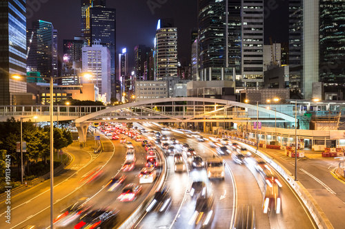 Traffic rushing in in the Central business district in Hong Kong photo