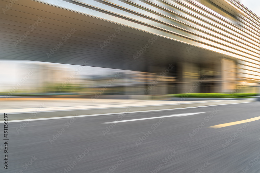 blurred urban road with city skyline background in china.