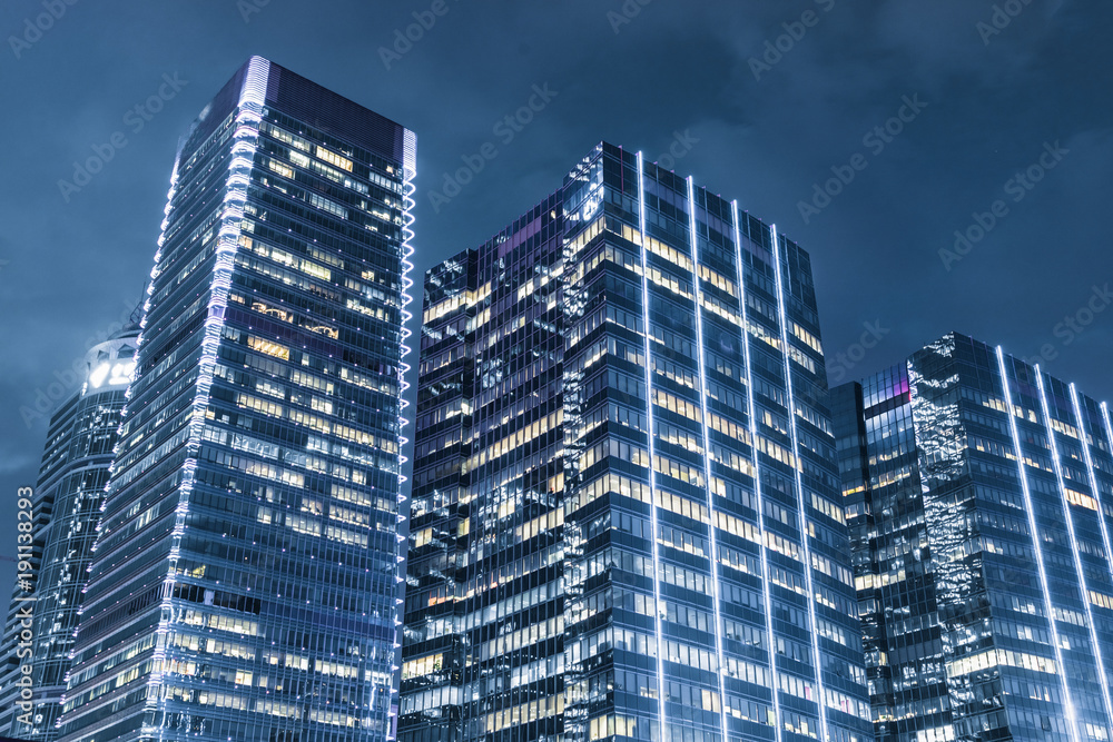 low angle view of illuminated modern building exterior low angle view of illuminated modern building exterior