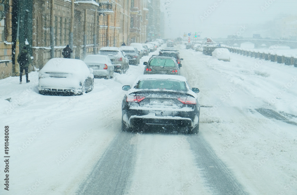 snowfall on the roads of the modern big city snowfall on the roads of the modern big city