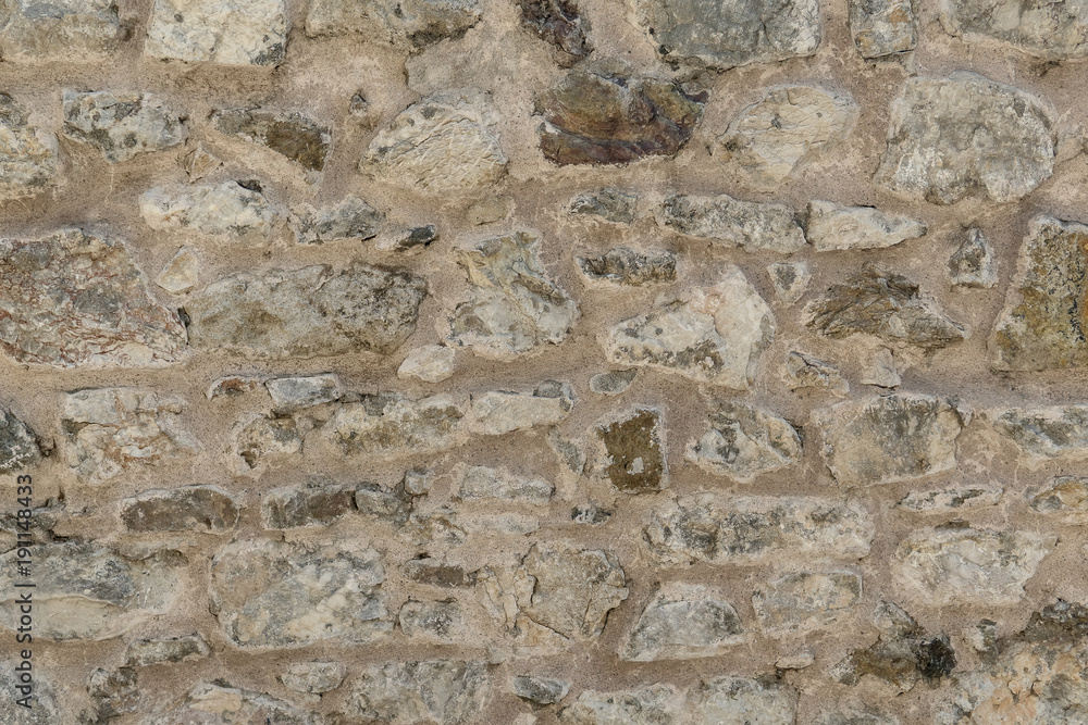 Granite texture, stone wall surface closeup Granite texture, stone wall surface closeup
