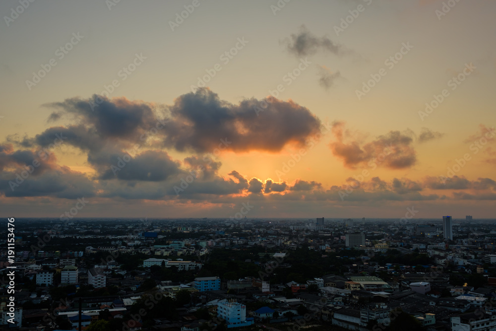 Cityscape at evening with clouds skyline twilight and sunset
