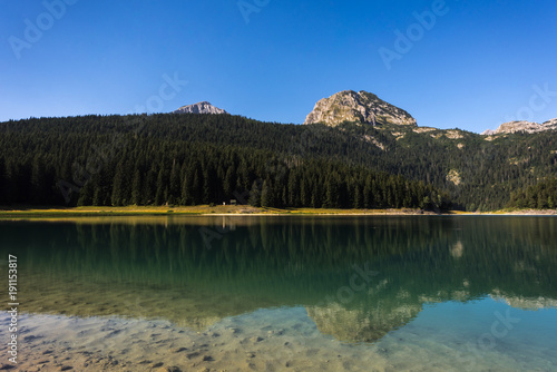 Black Lake - Mountain lake and tourist attraction  Crno jezero  with Meded Peak - reflections in the clear water  Montenegro  Europe