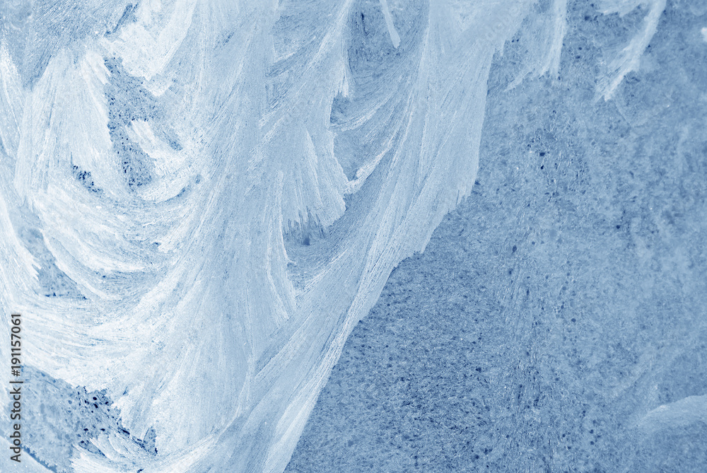 Ice on the window glass, natural background texture close-up Ice on the window glass, natural background texture close-up