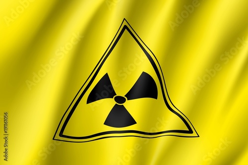 Yellow radiation sign triangle on yellow, realistic waving banner. Warning about threat to life, dangerous factory or plant, the production or storage of various substances. Vector illustration