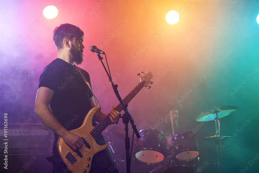 Obraz premium Bass player perform on stage.