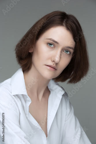 The face of attractive serious woman