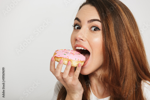 Close up portrait of a hungry young woman