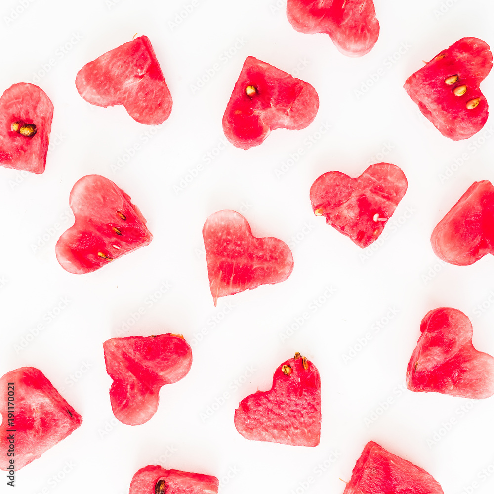 Valentine's day hearts pattern made of watermelon on white background. Flat lay, top view. Valentine's day hearts pattern made of watermelon on white background. Flat lay, top view.