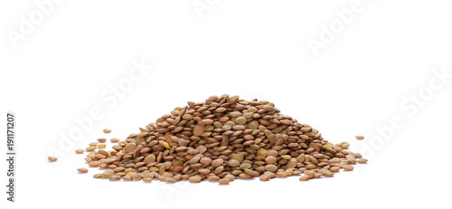 Pile of green lentils isolated on white background