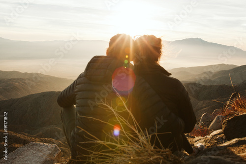Couple overlooking palm springs from keys view in joshua tree national park